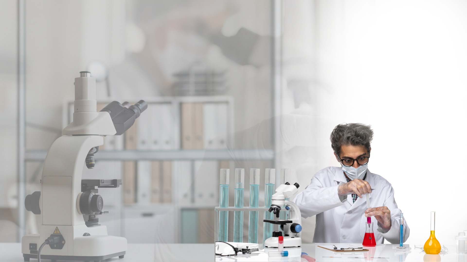 Clean modern laboratory showing blood test tubes and medical equipment